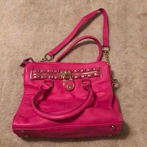 Bright pink purse.